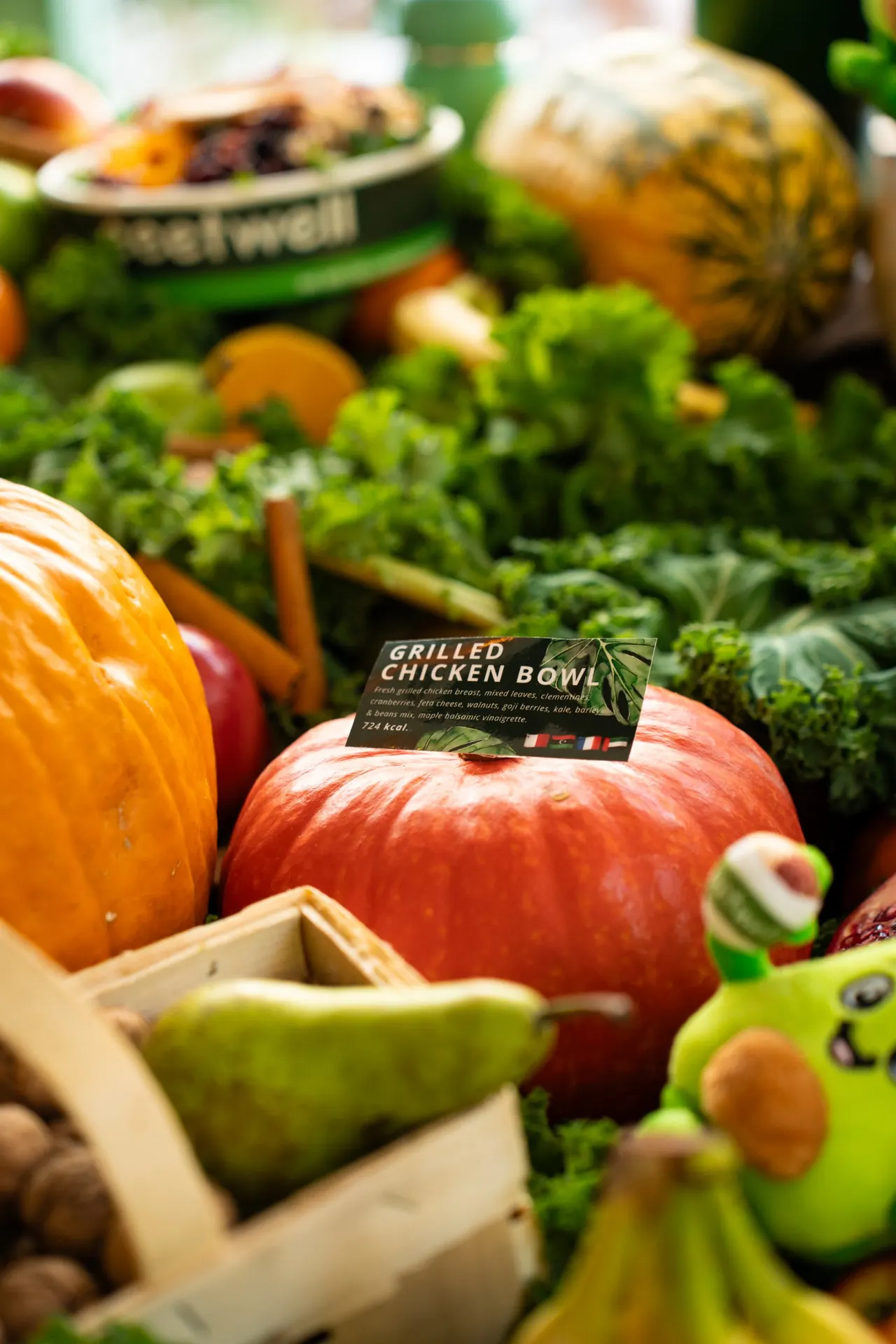 eeetwell grilled chicken bowl menu card among autumn produce